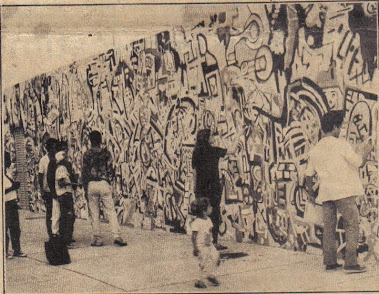 Pintur a de muro num CIEP com participação de alunos da escola