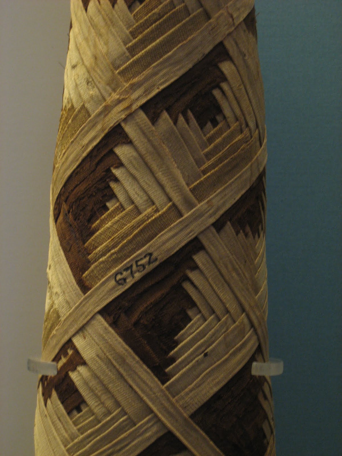 by rios WRAPPING MUMMIES FROM V&A.