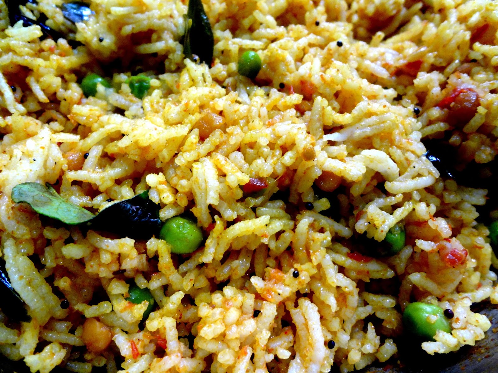 Tomato Rice with spring onions and green peas.