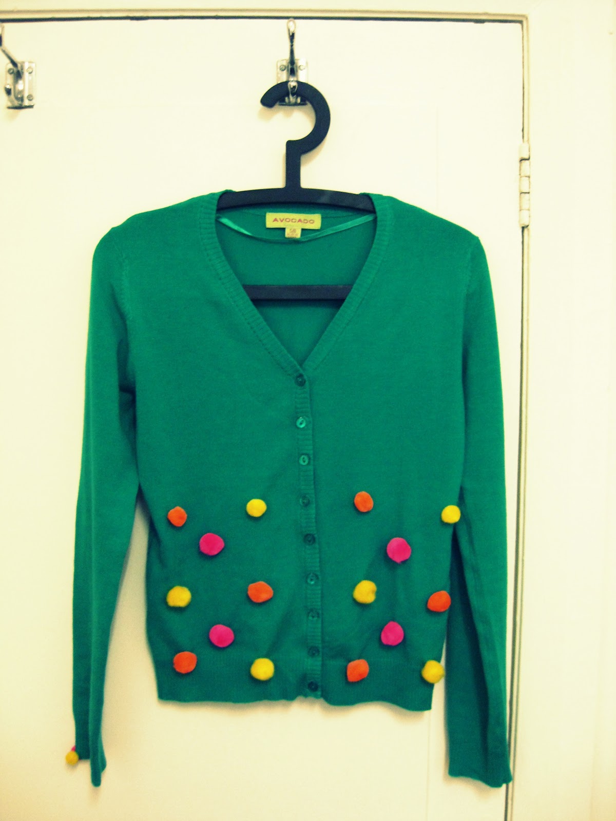 because she started knitting DIY Pom Pom Cardigan