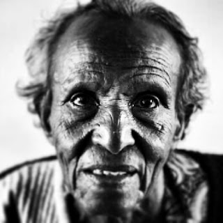 Photograph of old woman in Ethiopia by Ethiopian photographer Michael Tsegaye