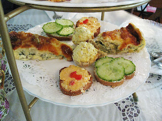 Crostinis with cucumber and goat cheese spread, and sun-dried tapenade, egg salad in pastry, and a hearts-of-palm and mushroom quiche