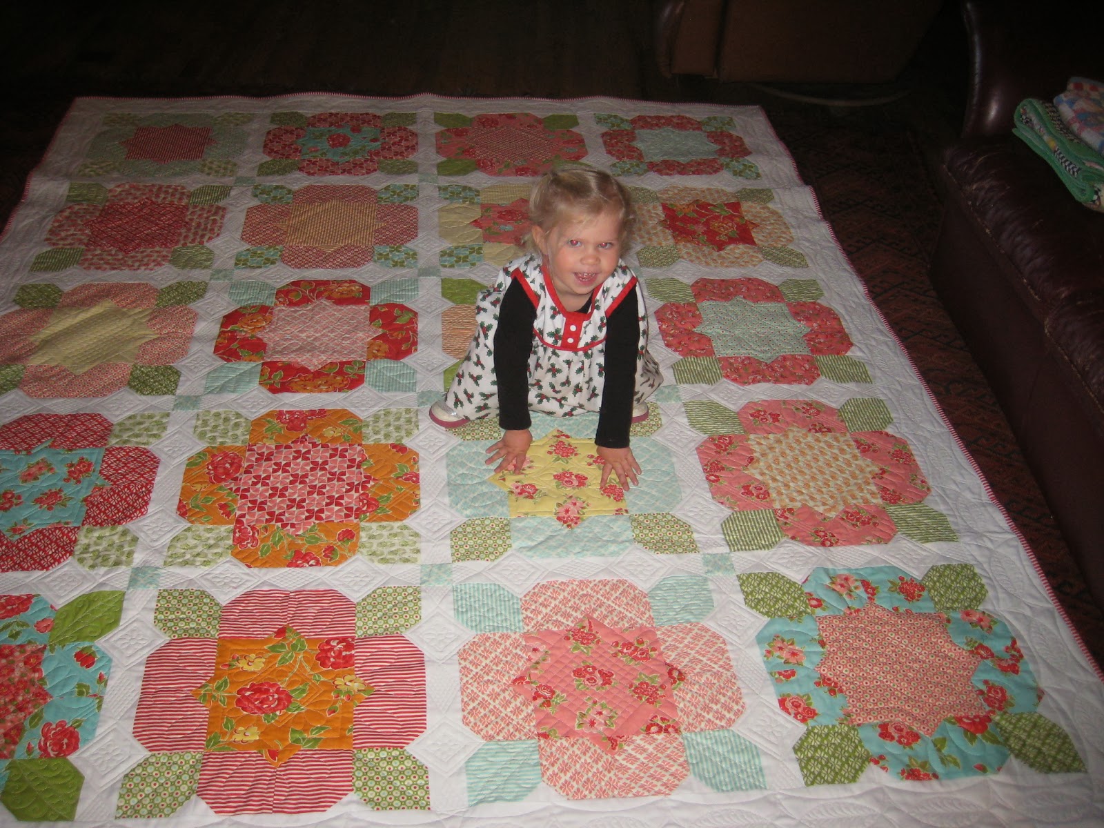 Threads on the floor Holly's Flower Girl quilt