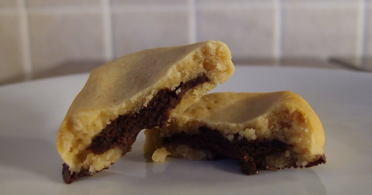 The Caked Crusader Peanut butter cookies with ganache filling