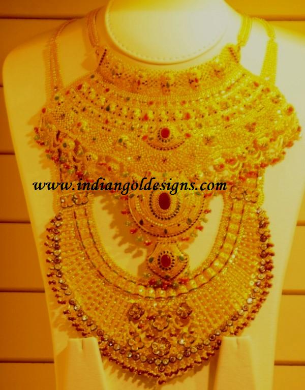 Gold and Diamond jewellery designs kalyan jewellers heavy bridal necklaces