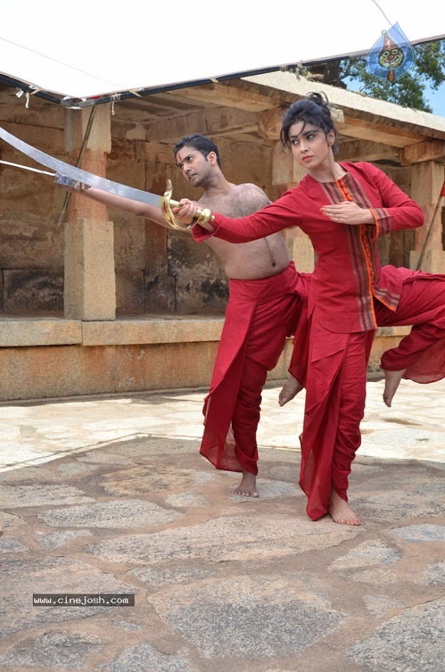 Shriya Saran doing fighting stances in red outfit from chandra - (7) -  Shriya Saran red outfit photo from Chandra