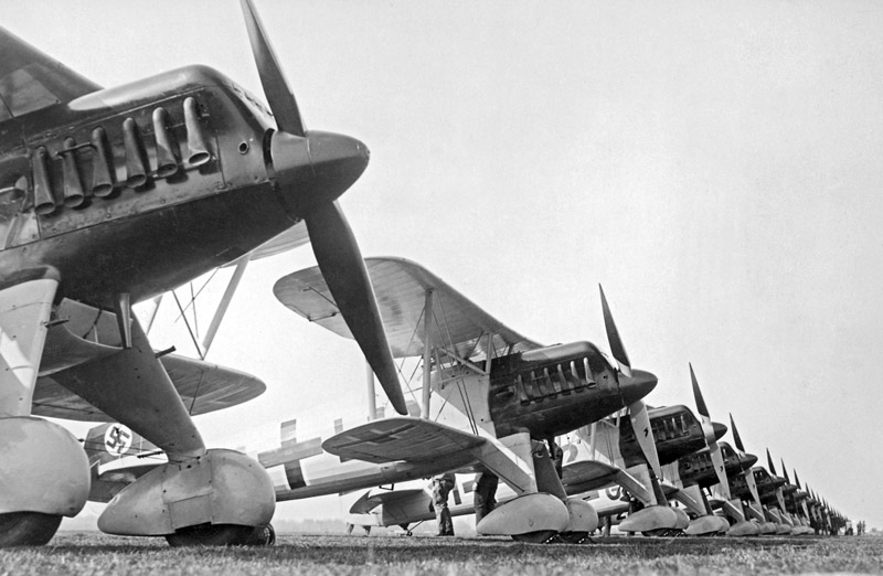 Airplanes in the skies + FAF history Heinkel He 51