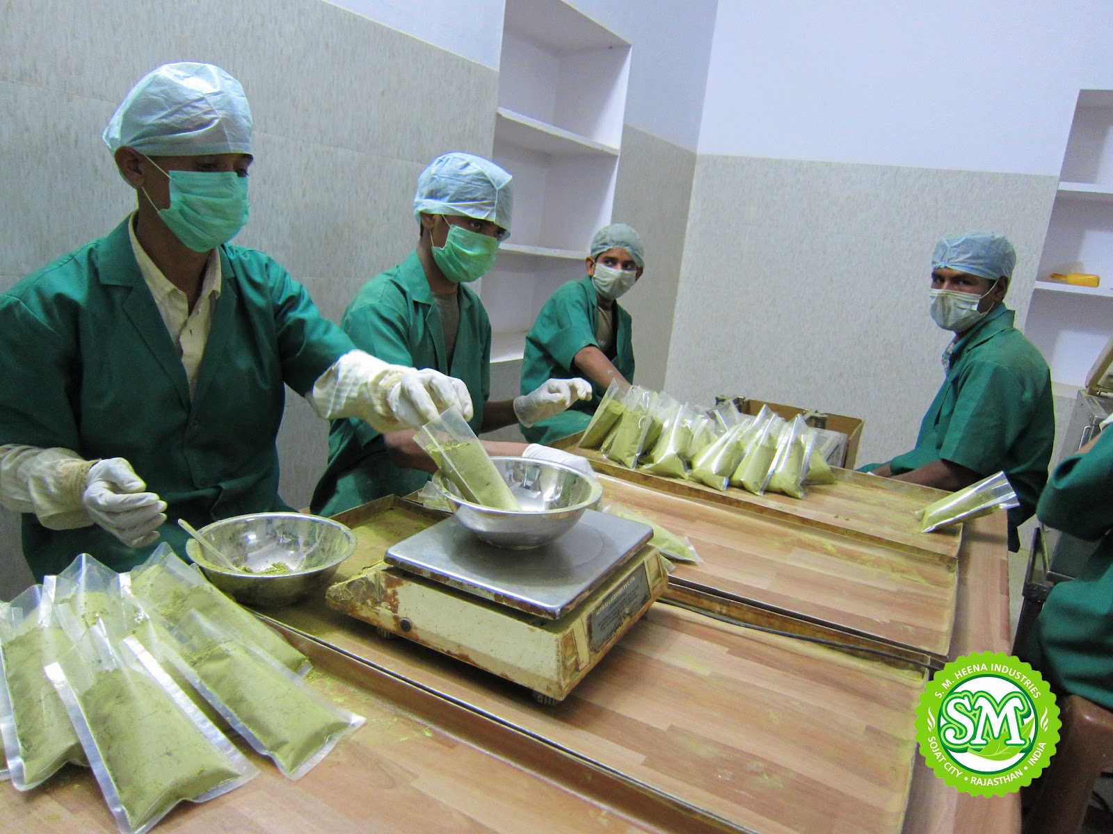 S. M. Heena Industries: Packaging of henna powder and other herbs in