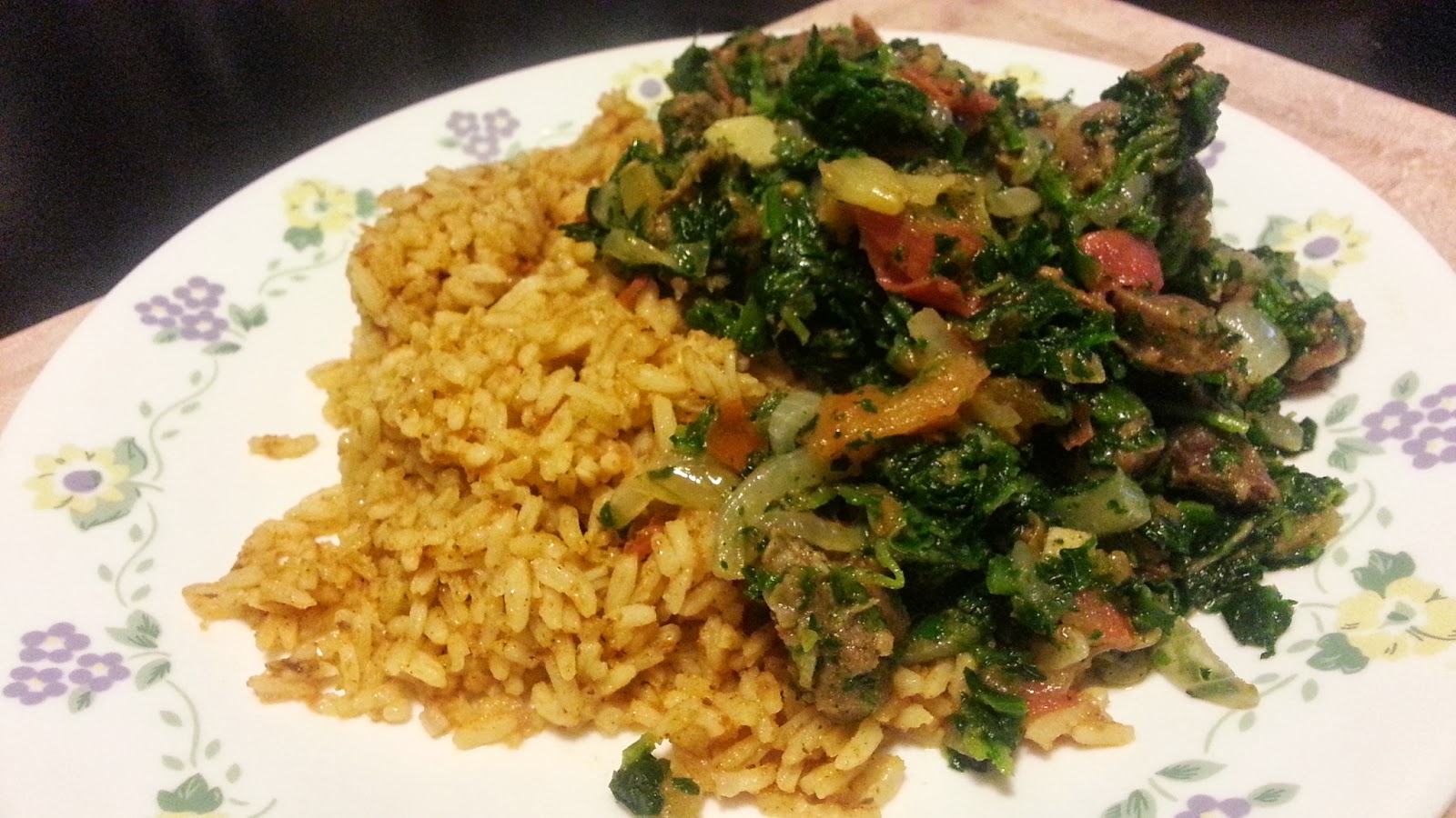 Jollof Rice With Gizzard and Spinach Sauce