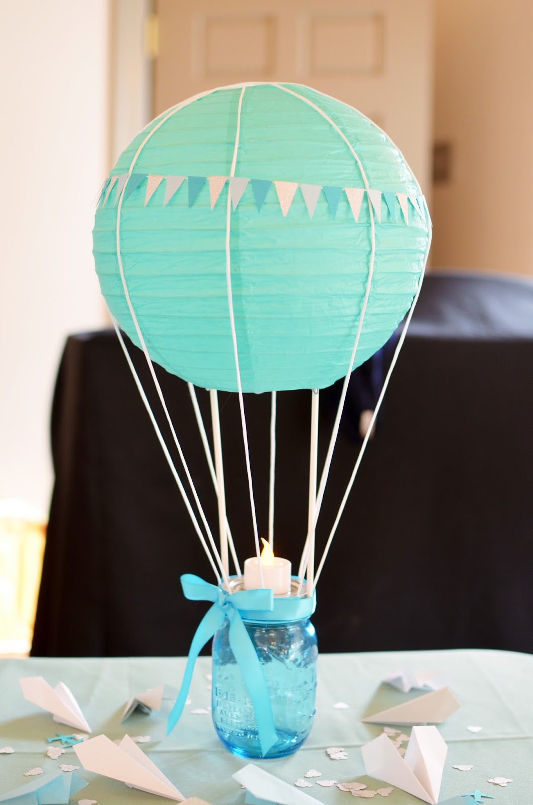 I started with a 10 inch paper lantern (on clearance- under $2 each at  Target), and attached it to
