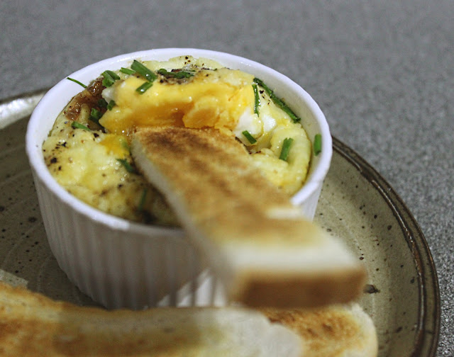 Cheese and tomato baked eggs with soldiers Amuse Your Bouche