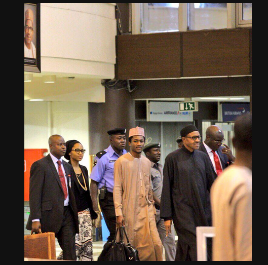 Buhari and his children at Abuja airport
