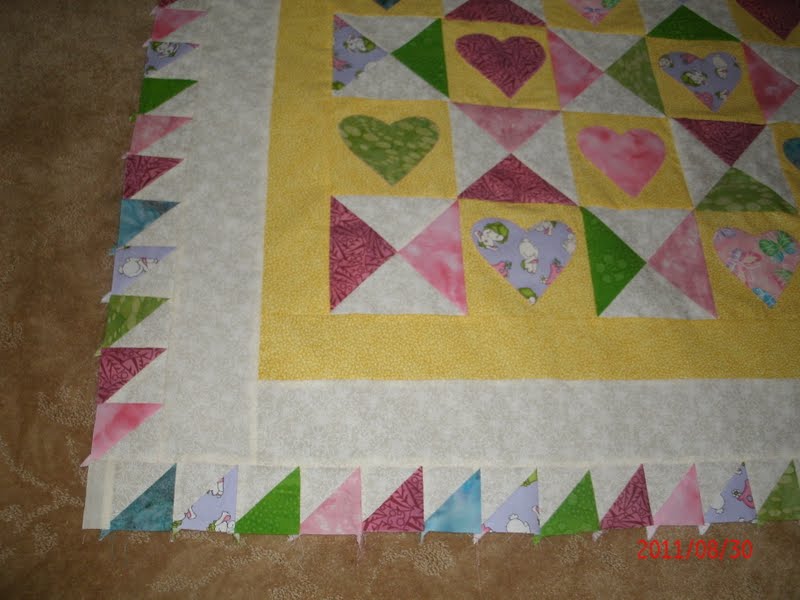 The Magic of Quilting Half Triangle Square Border