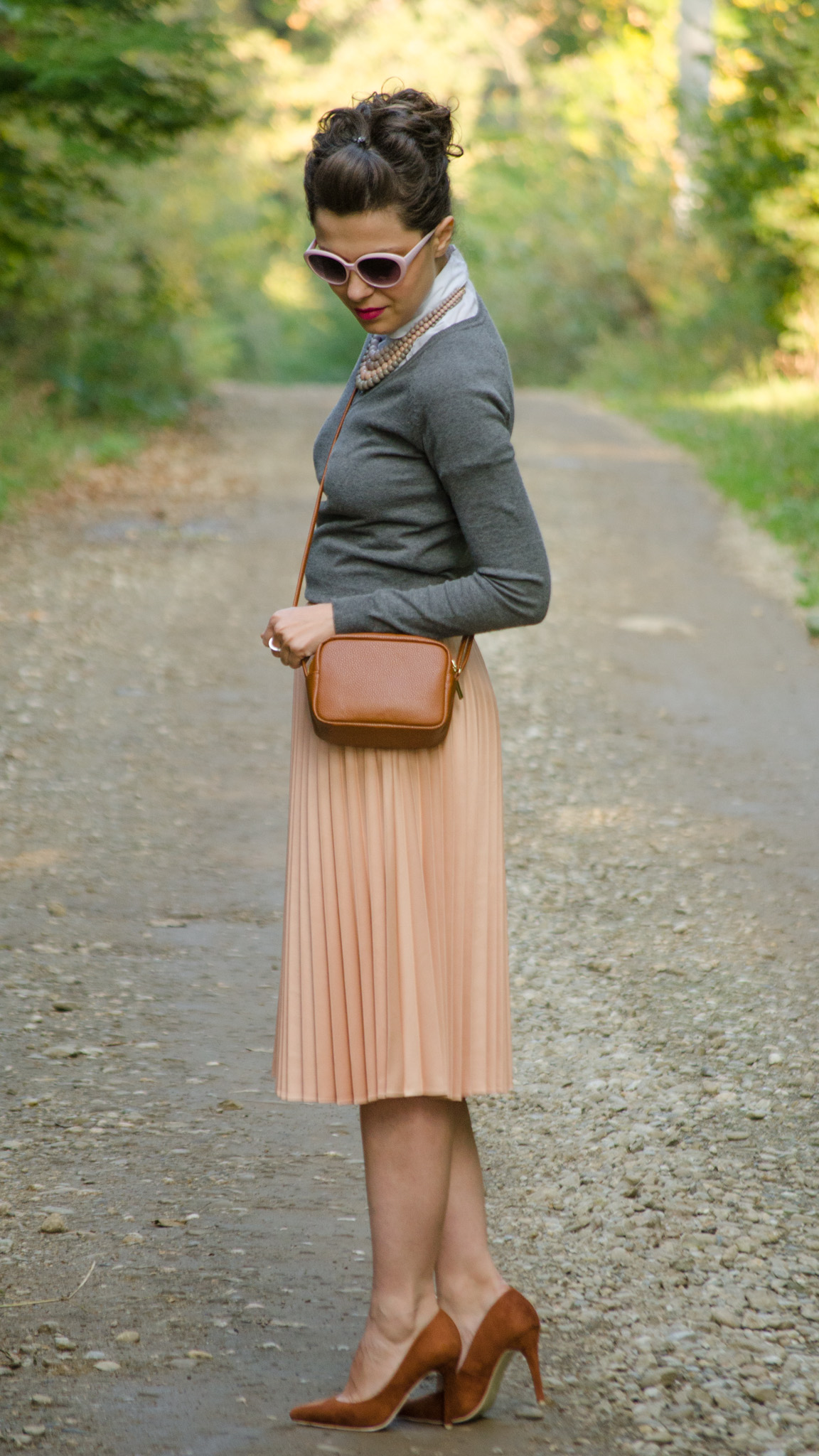 pastels pleated skirt dusty pink grey sweater white shirt statement necklace little brown satchel bag brown heels