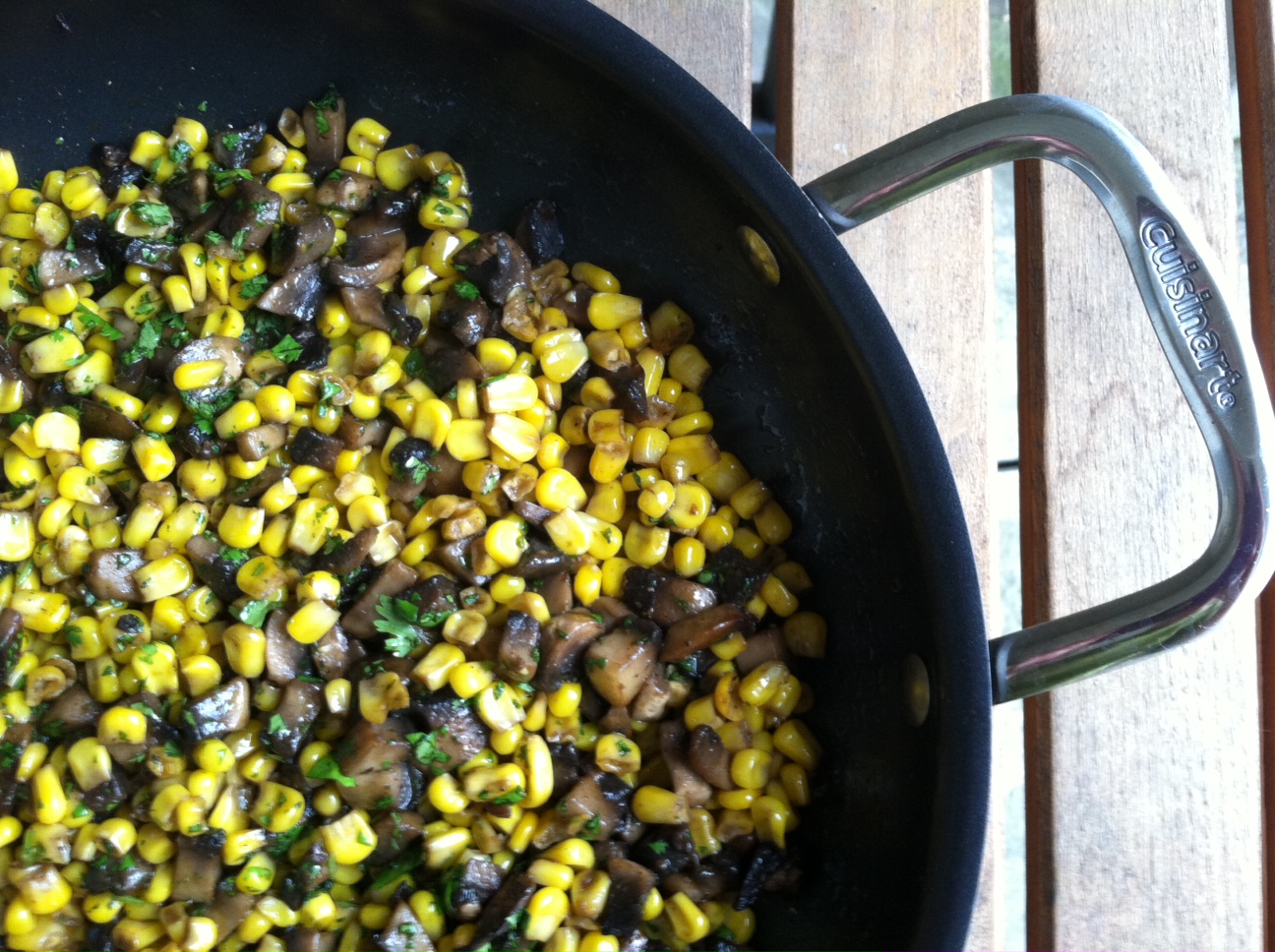 A Taste of Home Cooking Corn and Mushrooms with Cilantro