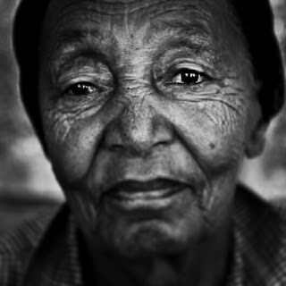Photograph of old woman in Ethiopia by Ethiopian photographer Michael Tsegaye