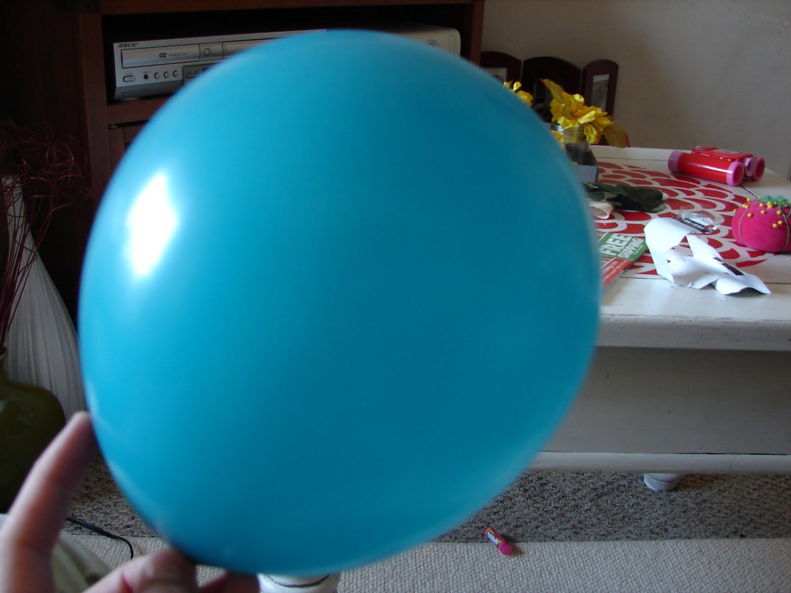 A girl and a glue gun twine ball (ur..lantern?)