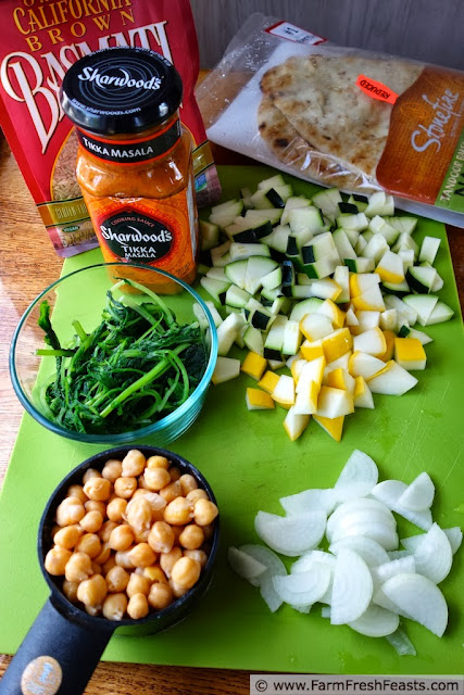 Squash, Mustard Greens, and Chick Pea Masala Stew (Fast From The Farm Share)