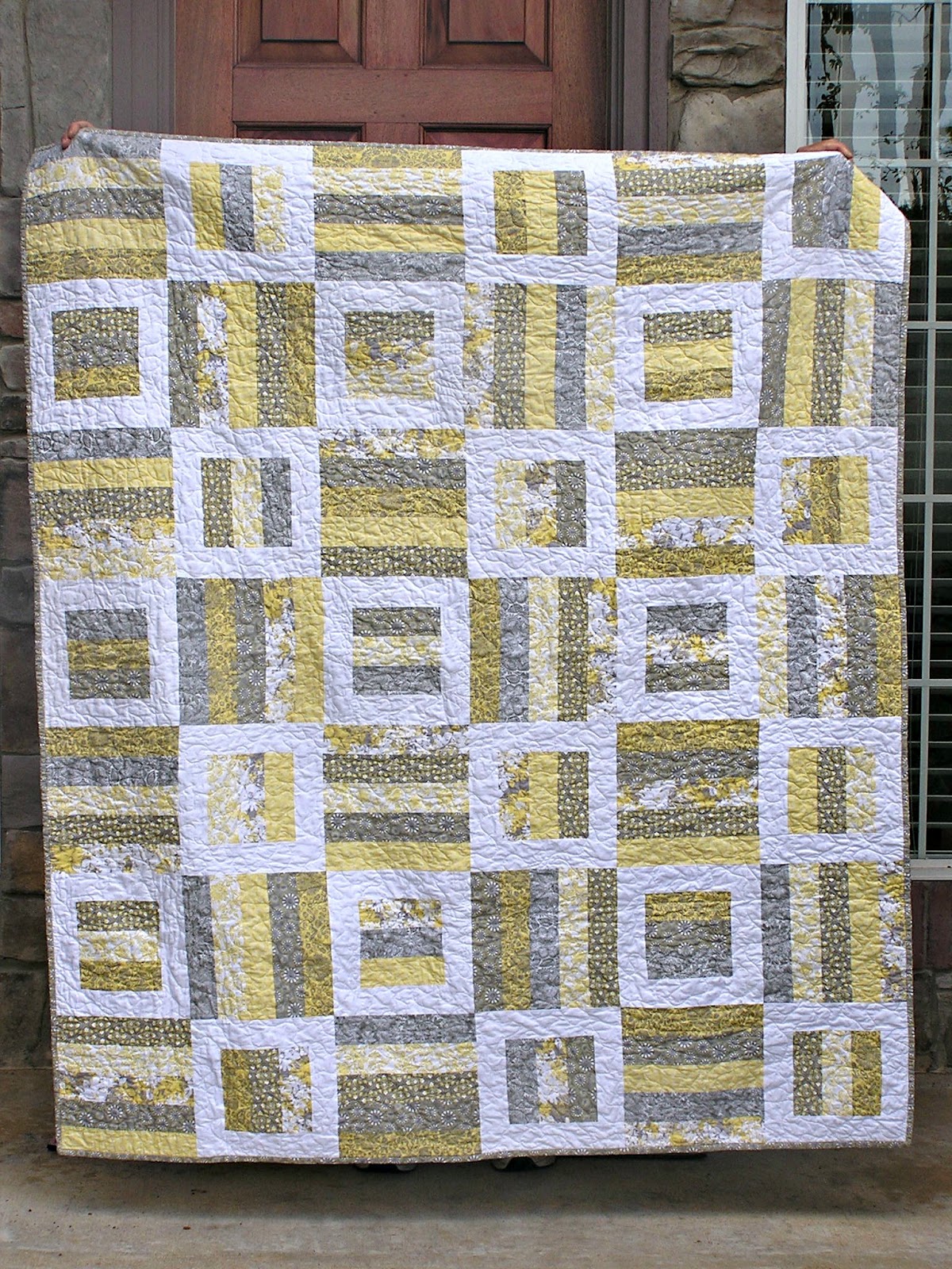 The Fleming's Nine Gray and Yellow Quilt