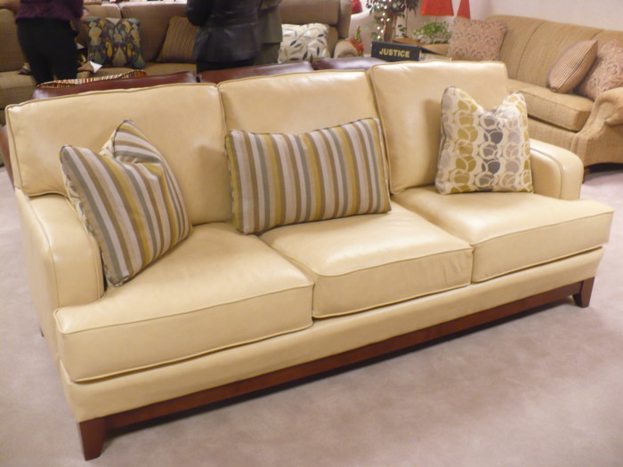butter yellow leather sofa with front arch support
