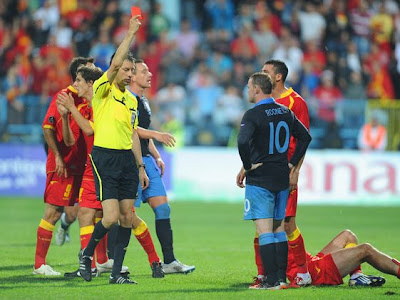 Red-card-shown-by-referee-Stark-to-Rooney.jpg