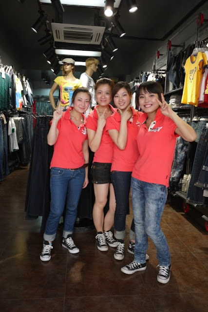 Four Chinese female shop workers