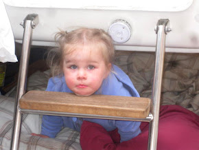 Marin discovered grandma's bed made a great playhouse!