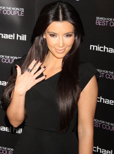 Kim Kardashian with her kourtney kardashian engagement ring. Kim Kardashian with her