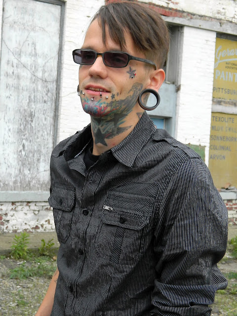 mohawk and tattoos, male tattooed model alt alternative rocker style, Eighty Eight Platinum, DIY jeans