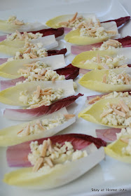Easy Appetizer, perfect for guests! Endive layered with cheese, nuts and honey.