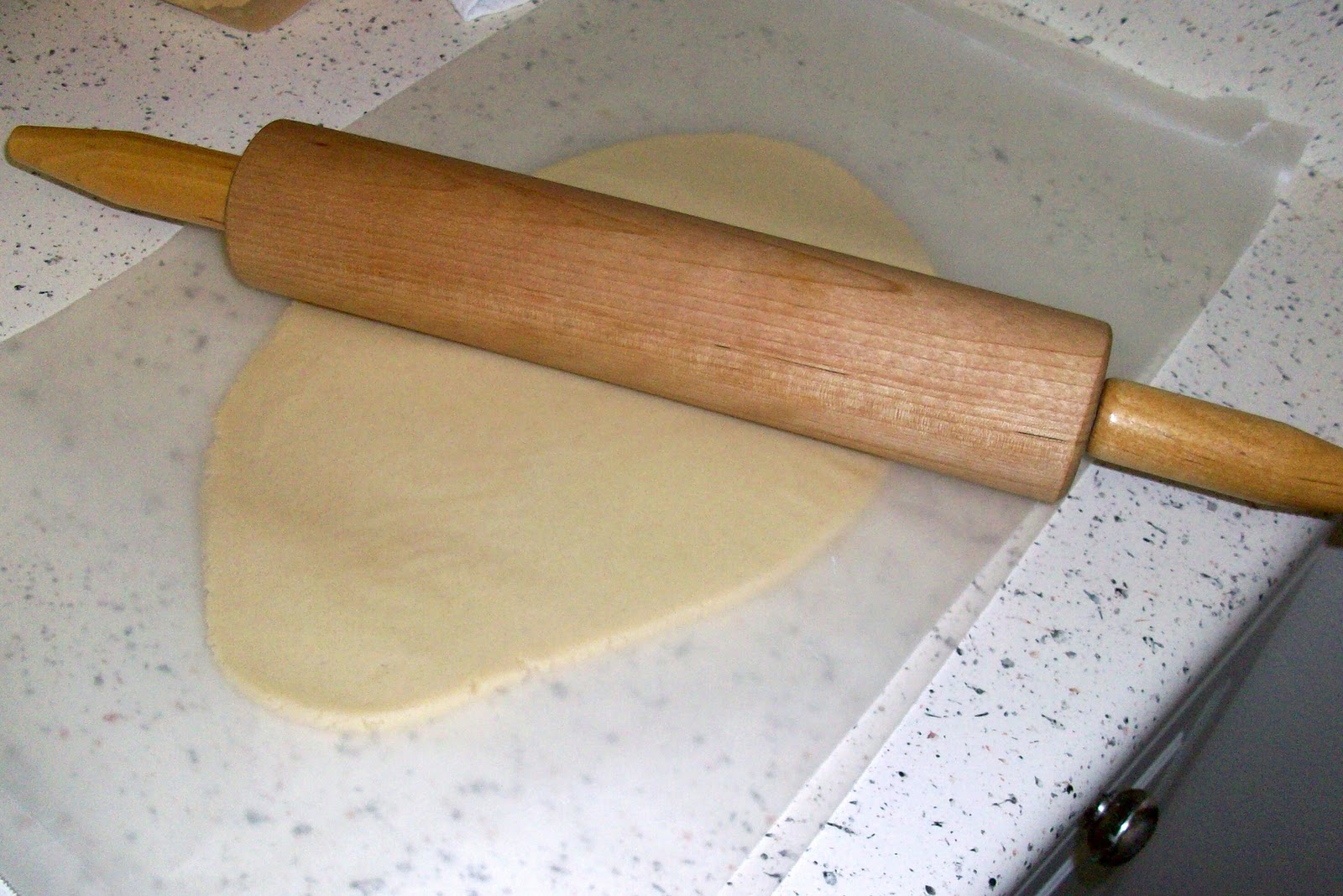 between the wax paper) on a coo...