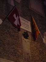 Swiss and Geneva flags at La Treille plaque commemorating 31 December 1813