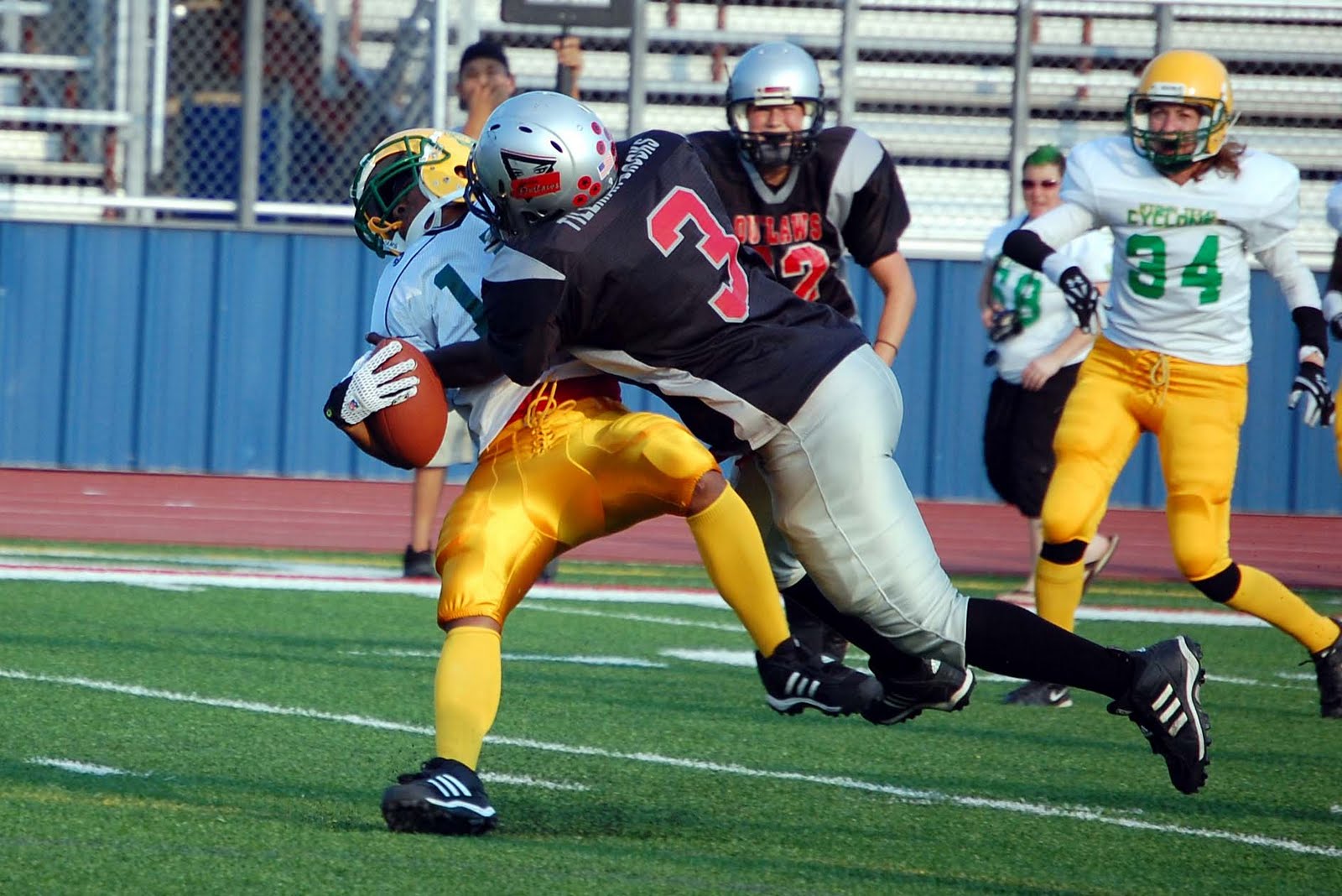 Women Who Play Football Tackling 2