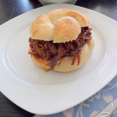 Slow Cooker Shredded Barbecue Chicken:  A very simple and delicious recipe with only 2 ingredients, cooked in a slow cooker.  Great for parties, gameday, or weeknight dinners.