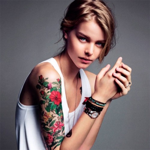 I'm intrigued by gorgeous women with half sleeve tattoos