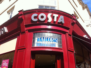 Ghost sign for Tailors, now a coffee shop, in Stroud, Gloucestershire