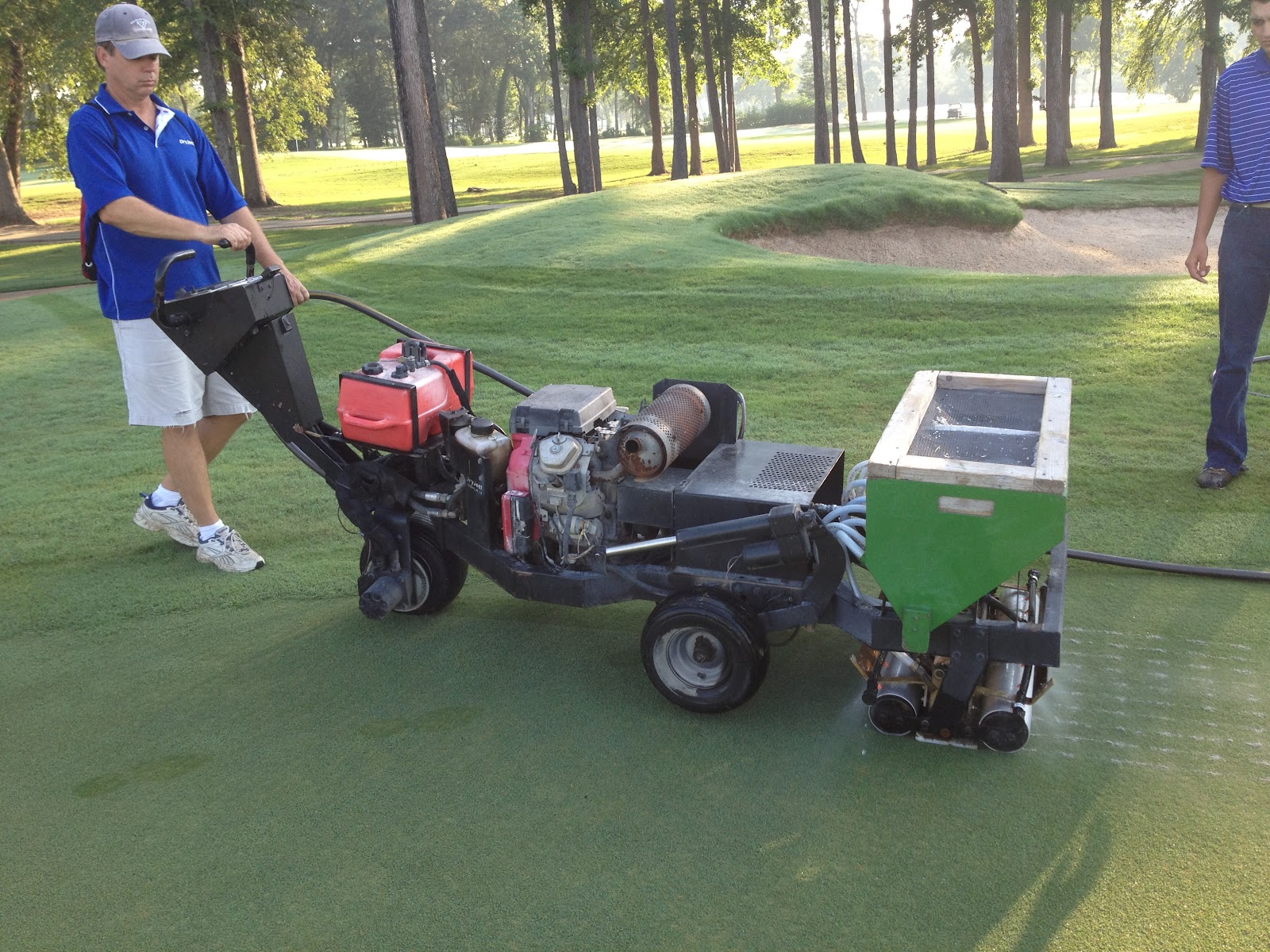 Hollytree Country Club Golf Course Maintenance Dryjecting greens.