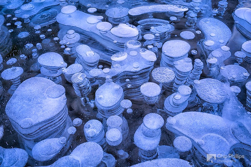 3. Bubbles Trapped Beneath The Ice On Abraham Lake, Canada - 18 Beautiful Frozen Lakes, Oceans And Ponds That Resemble Fine Art 3. Bubbles Trapped Beneath The Ice On Abraham Lake, Canada - 18 Beautiful Frozen Lakes, Oceans And Ponds That Resemble Fine Art