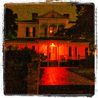 The 1897 Poe House at night