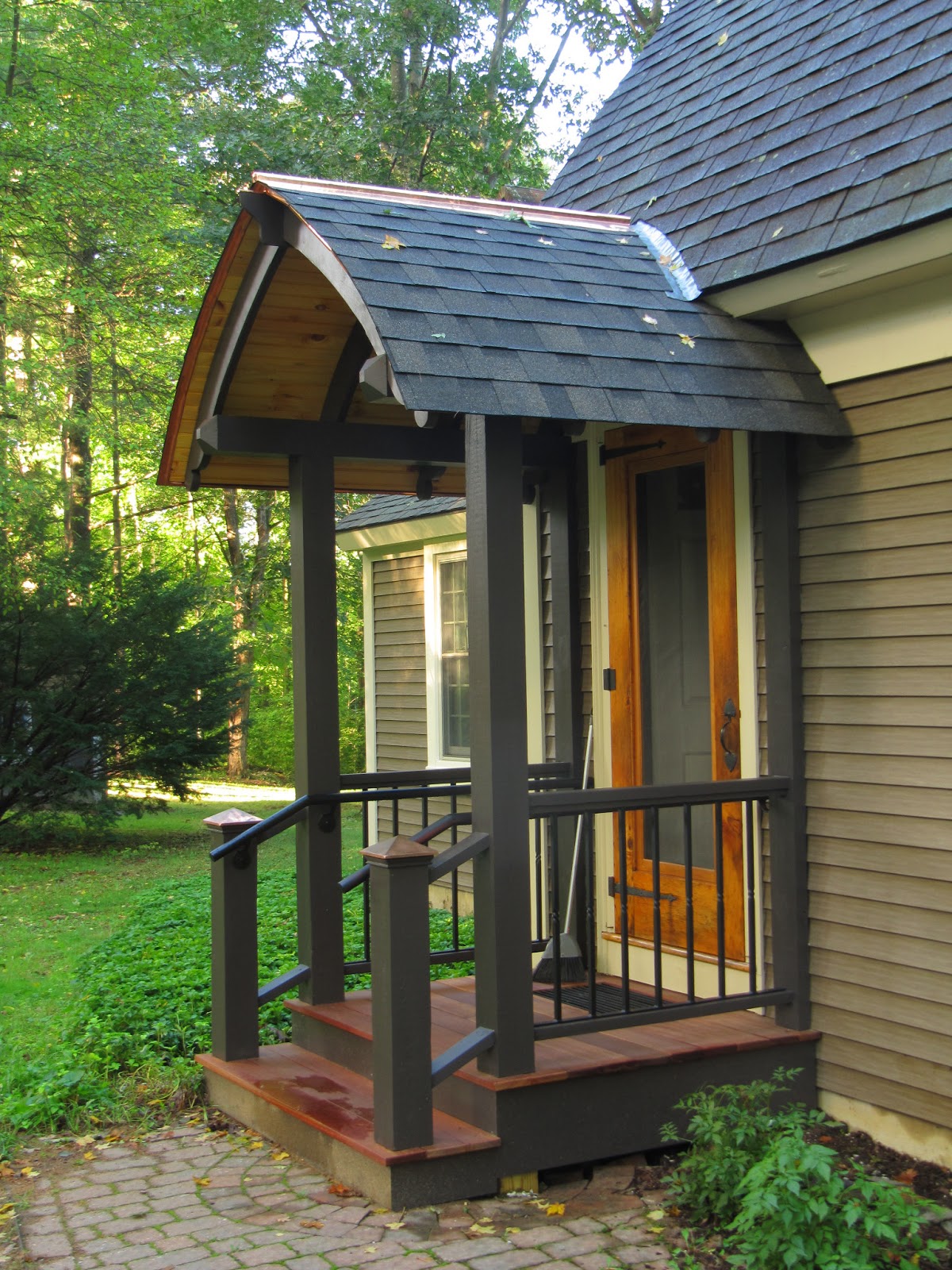 Three Oaks Construction A quaint little porch
