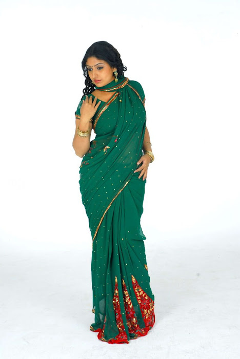 monica in green saree shoot cute stills