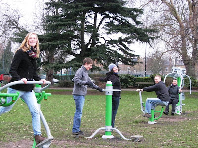 Five adults playing in the park