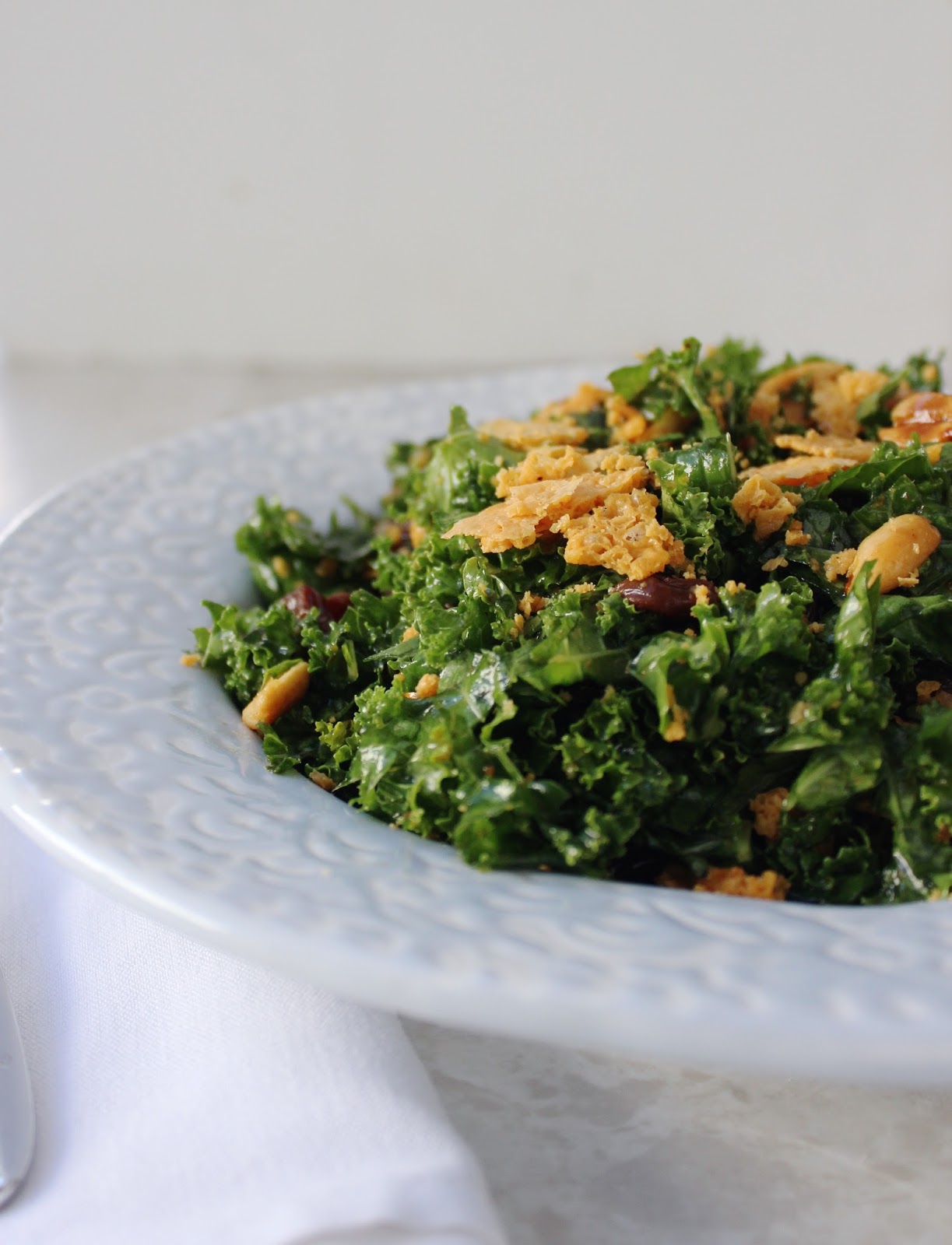 Stew or a Story Kale Salad with Raisins, Spicy Peanuts, and Crispy Cheddar