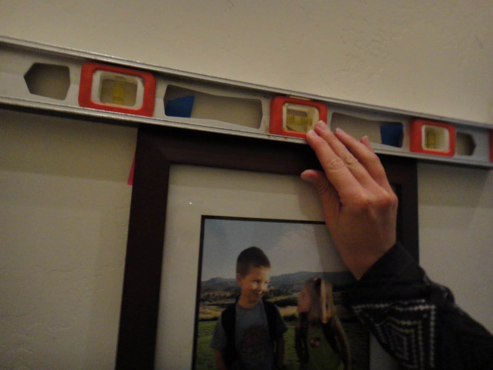 How to hang frames, art, wall shelves and other wall decor