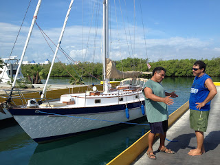 Felix and Nazario at the Puerto Isla Mujeres haul-out basin Felix and Nazario at the Puerto Isla Mujeres haul-out basin