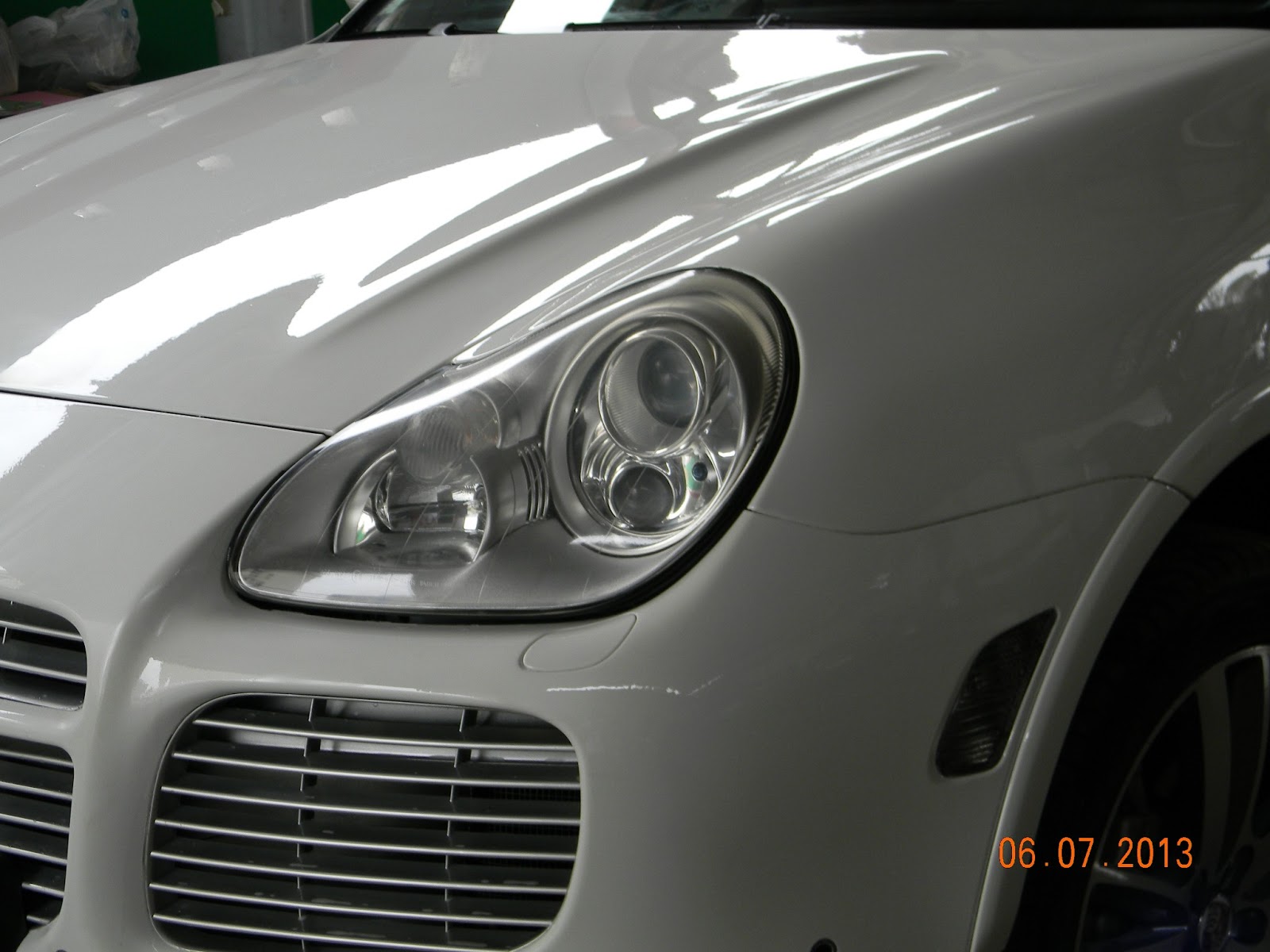 GARAGE FÉDÉRAL LIBREVILLE PEINTURE PORSCHE CAYENNE CHANGEMENT DE TEINTE DU NOIR AU BLANC