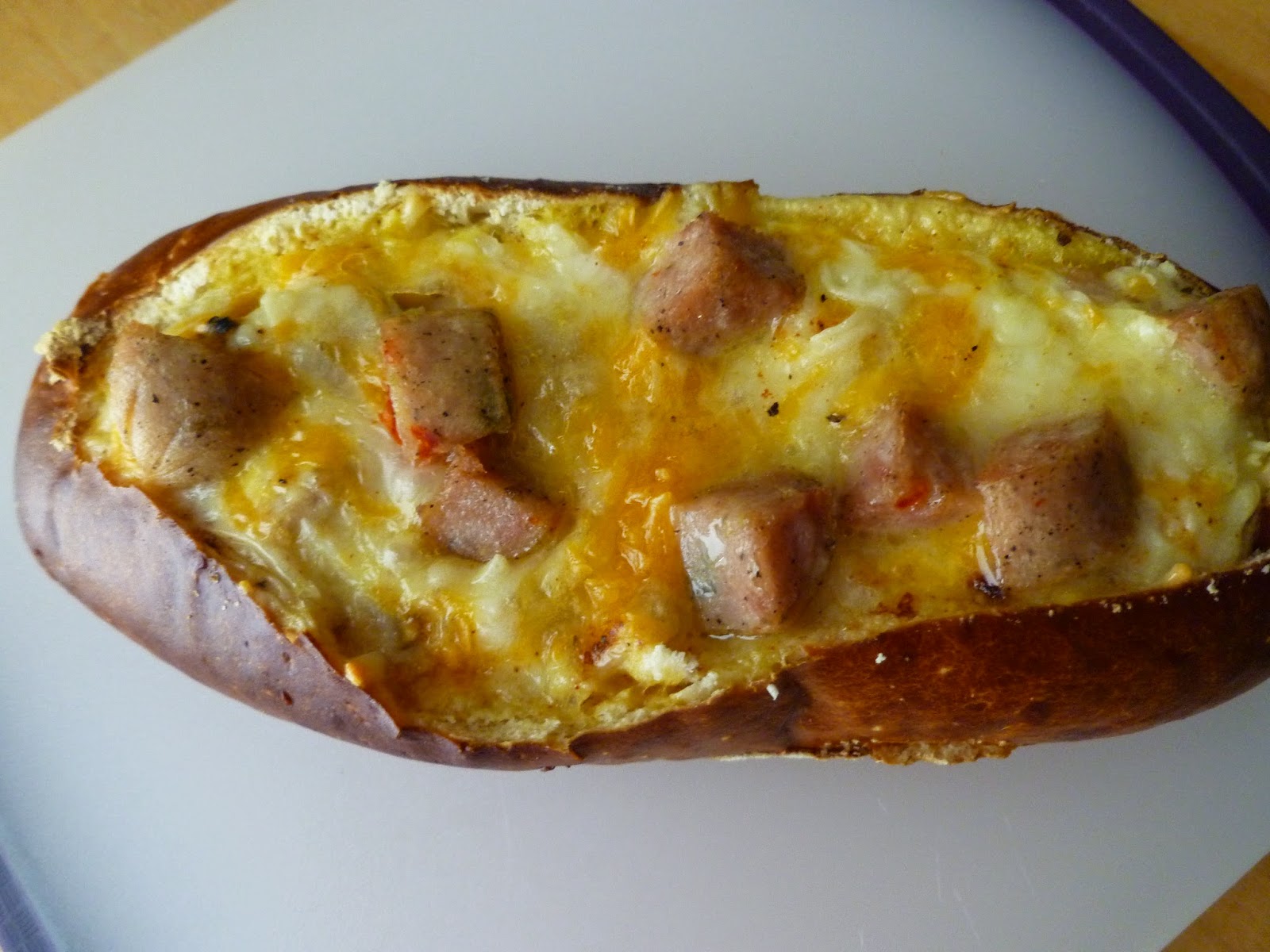 The Pastry Chef's Baking Sausage, Egg, and Cheese Pretzel Bread Boat