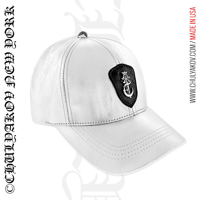 Designer Leather Baseball Hat with diamond sterling silver logo.