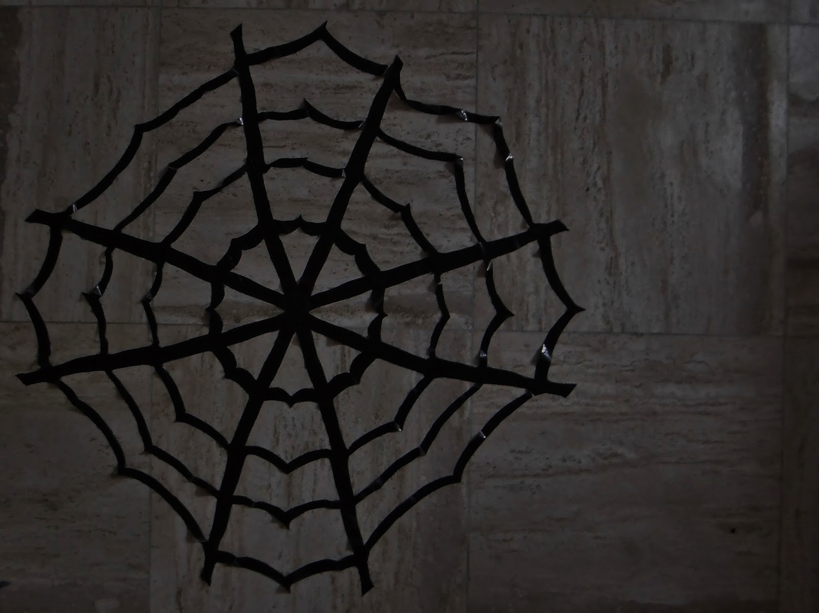 Once Upon A December The Halloween DIY Garbage bag spider web.