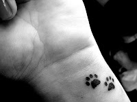 tatuagem patinhas pulso